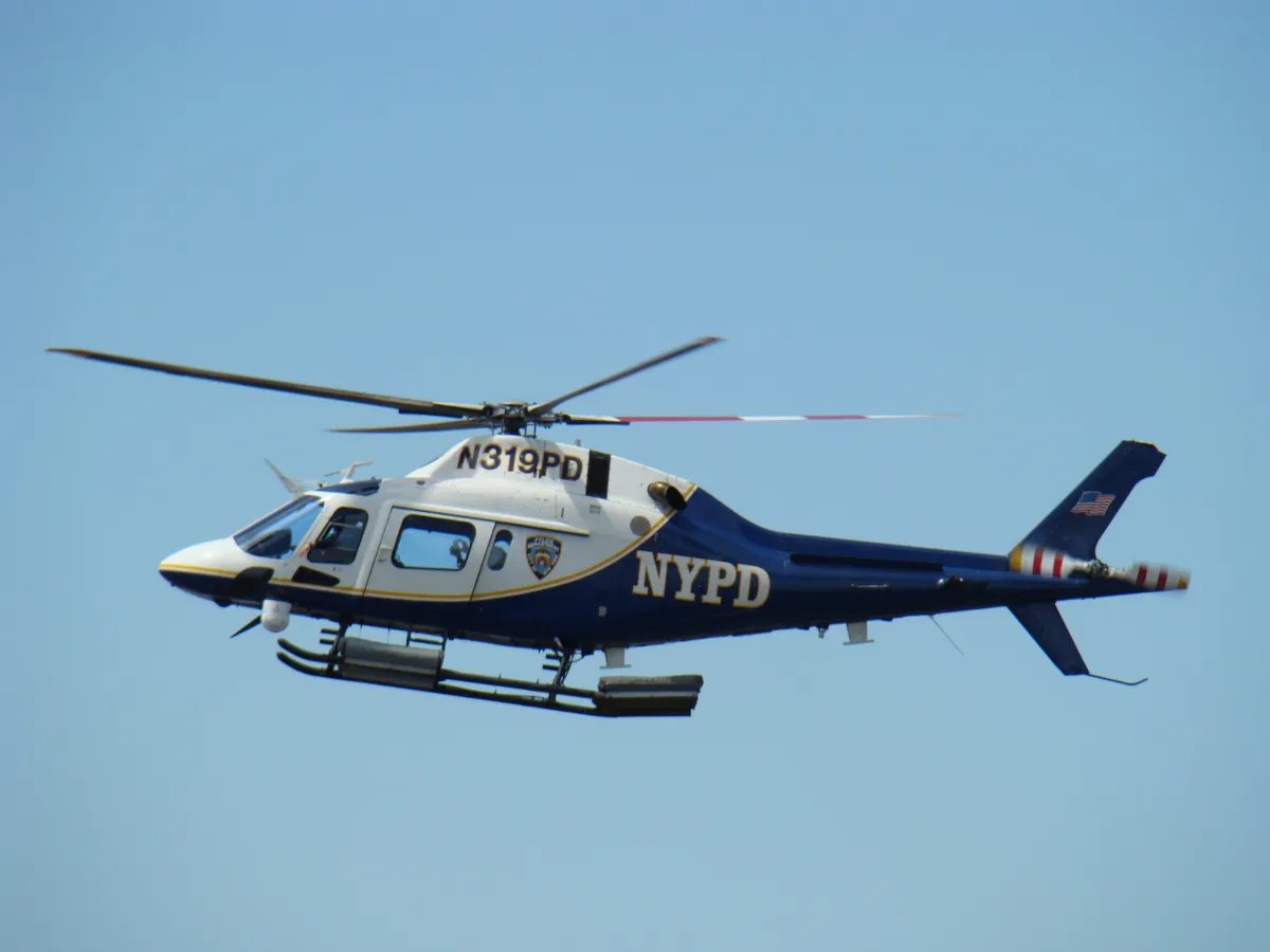 Representative AgustaWestland AW119 Koala police helicopter in flight.